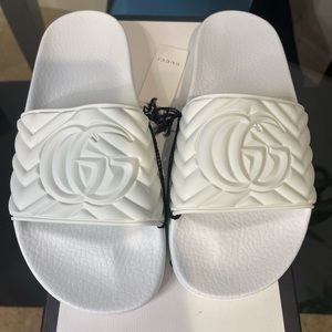 - Brand new in box with tags White Gucci slides